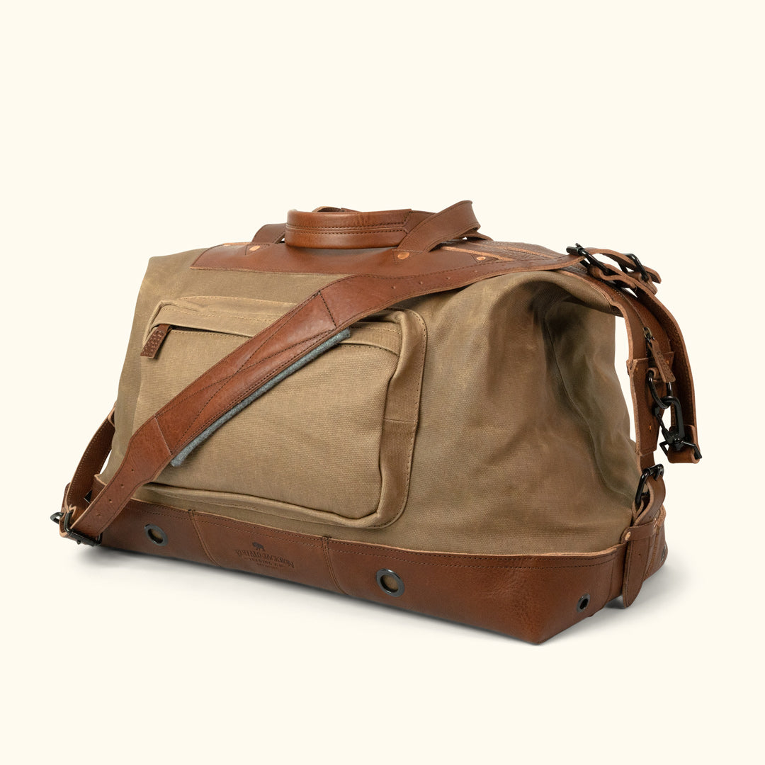 Buffalo Jackson Trading Co. Dakota Waxed Canvas Messenger Bag | Navy Charcoal w/ Saddle Tan Leather