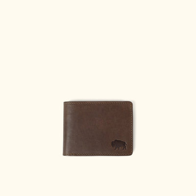 This classic billfold wallet, handcrafted from true leather. Made for men, hand stitched, and crafted with quality.