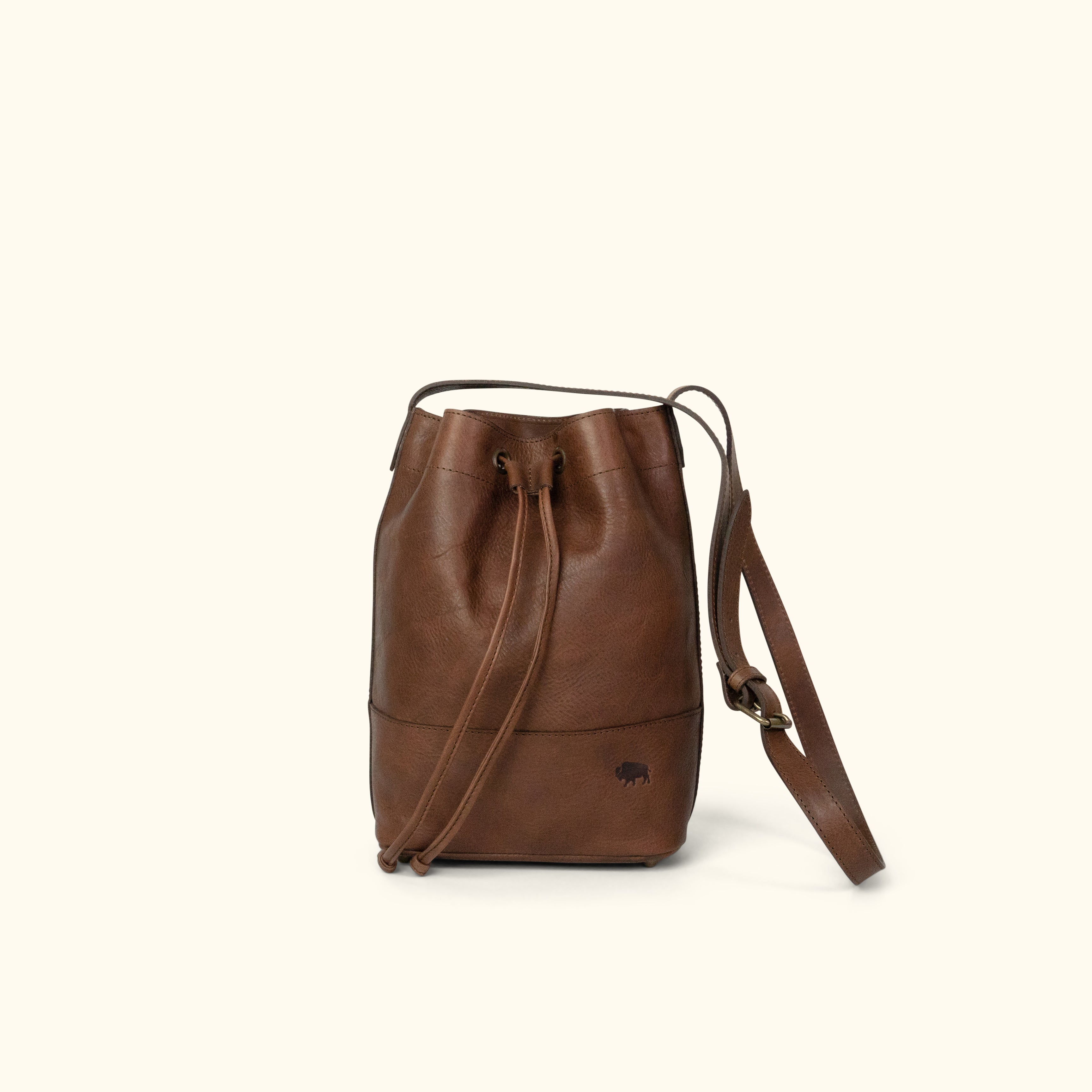 A CHOCOLATE BROWN IA AND BUFFALO LEATHER GARDEN PARTY BAG