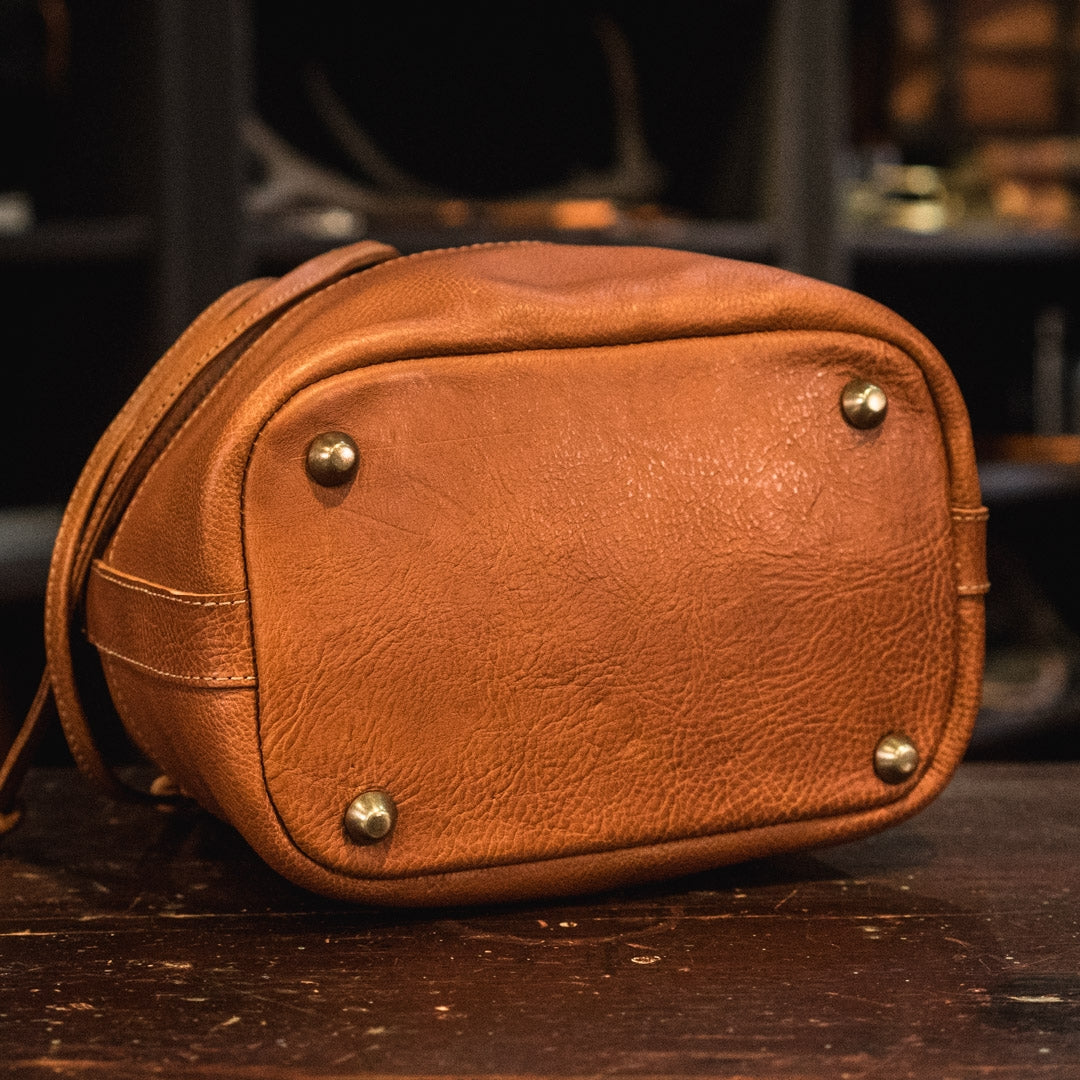 Madison Waxed Canvas Bucket Bag | Navy w/ Saddle Tan Leather