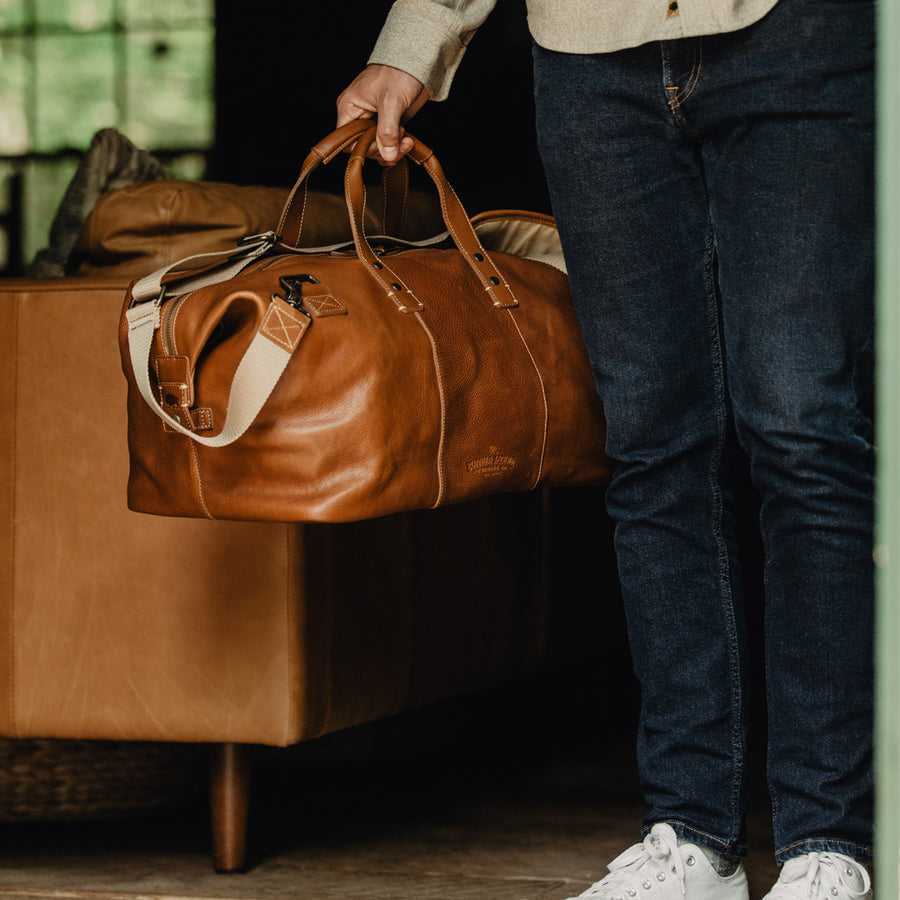 m&s mens travel bags MZ Wallace Black Jim Overnight Duffel Duffel handmade using a lightly waxed black canvas with full grain vintage brown leather detailing Ole Miss Rebels Men's Khaki