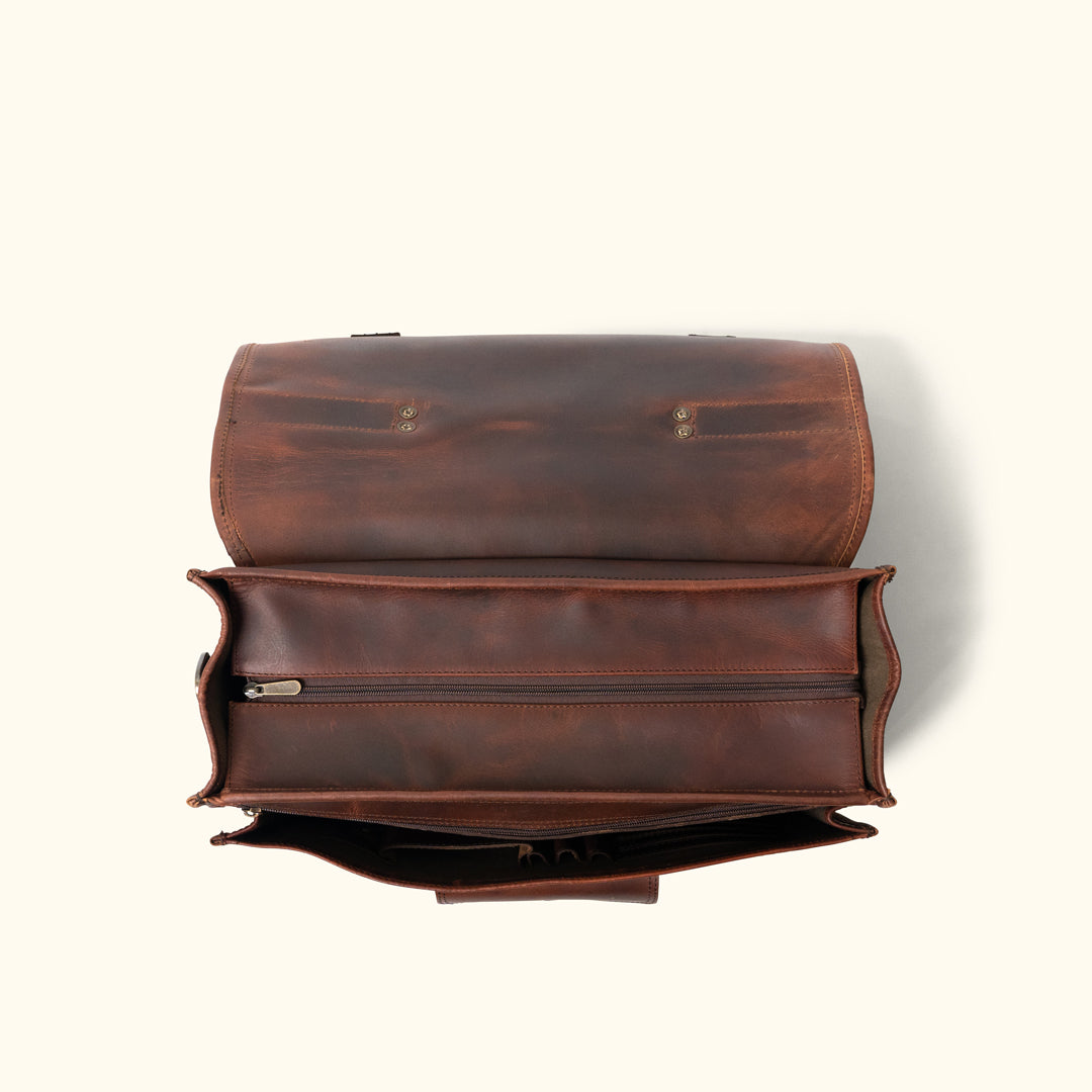 Top-down view of Men's Leather Briefcase Bag in Dark Oak, highlighting the full-length zipper and spacious interior compartment.