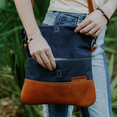 Madison Waxed Canvas Crossbody Foldover Clutch | Navy w/ Saddle Tan Leather hover